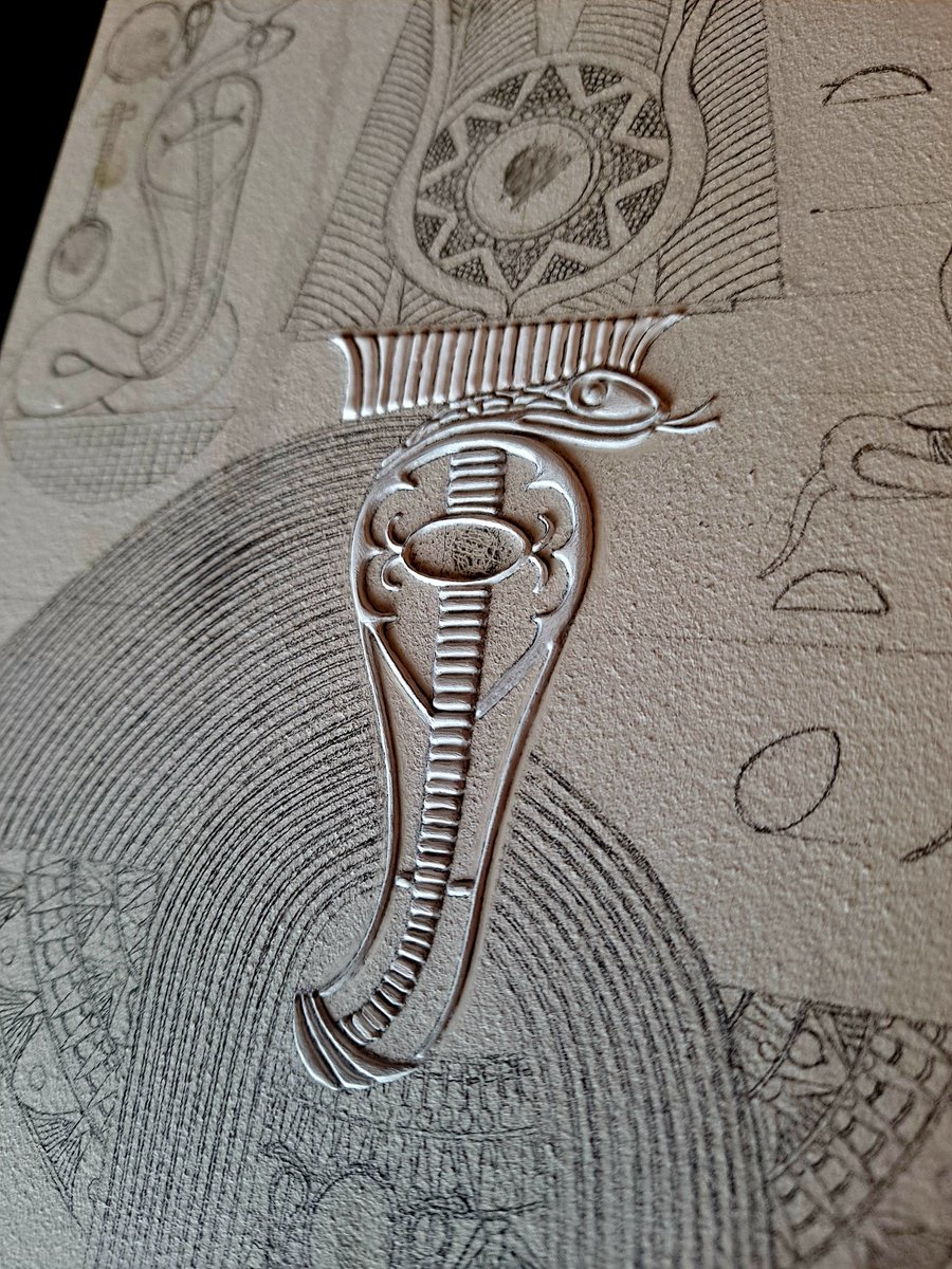 Ptahmassu's tweet image. Progress on the Akem-Shield of Renenutet Mistress of Souls. Her cobra head is sufficiently built though not finished, but I've moved on to Her horned and feathered crown, which will eventually be gilded in 22kt gold and platinum. iconsofkmt.com