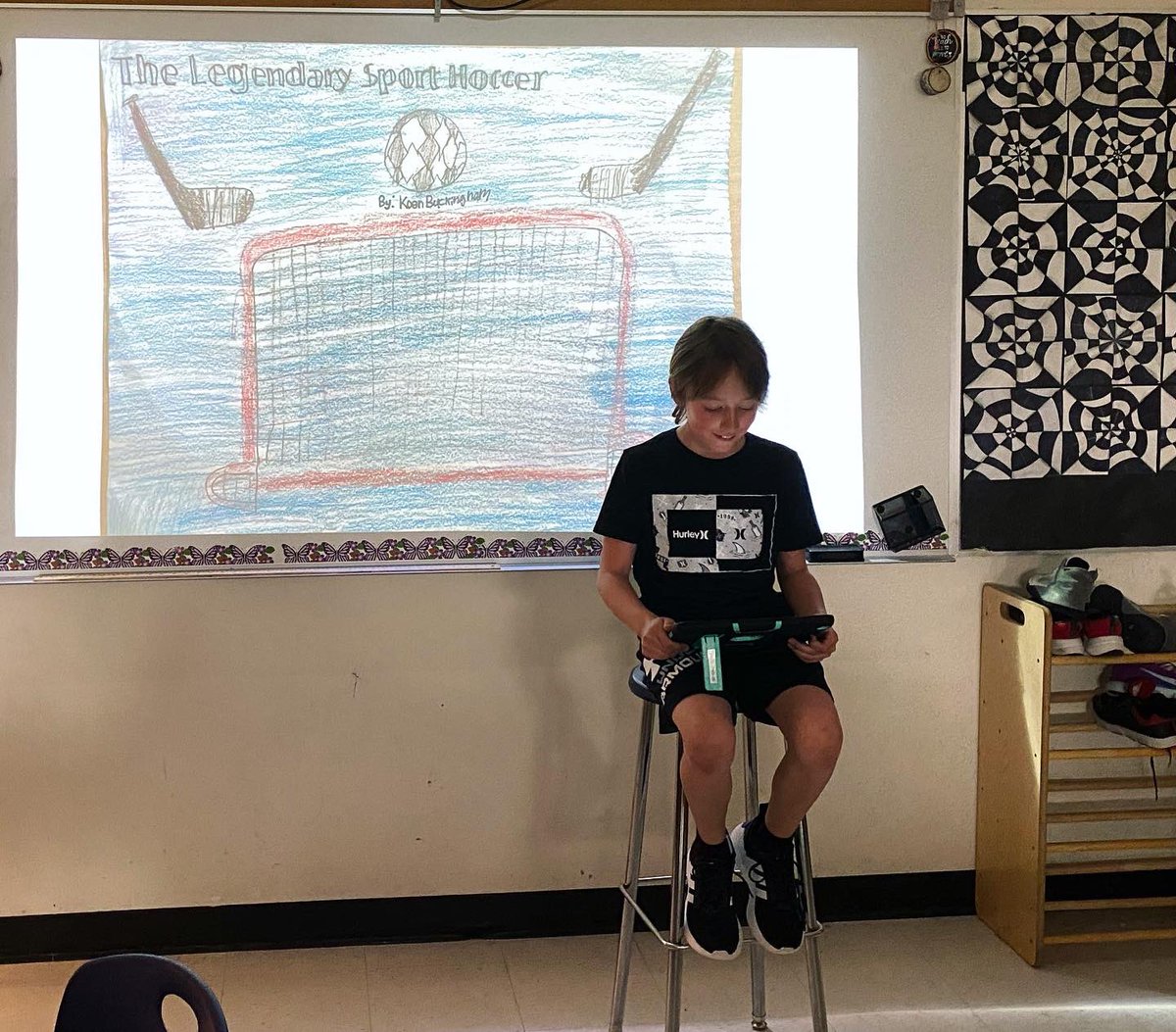 Author’s chair in room 2022! Each of us shared a part of our narrative stories with the class today. Check out our book covers in the background 👀