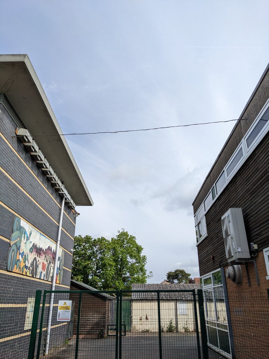 EcoHeathfield1's tweet photo. Our school is wonderful and swifts know it.  Today two swifts were seeking a nest site near our boxes. They were looking up and under the edge of the Rosla (on the right).  With luck they'll turn around and see our boxes 🤞 https://t.co/PM3HkjT15M