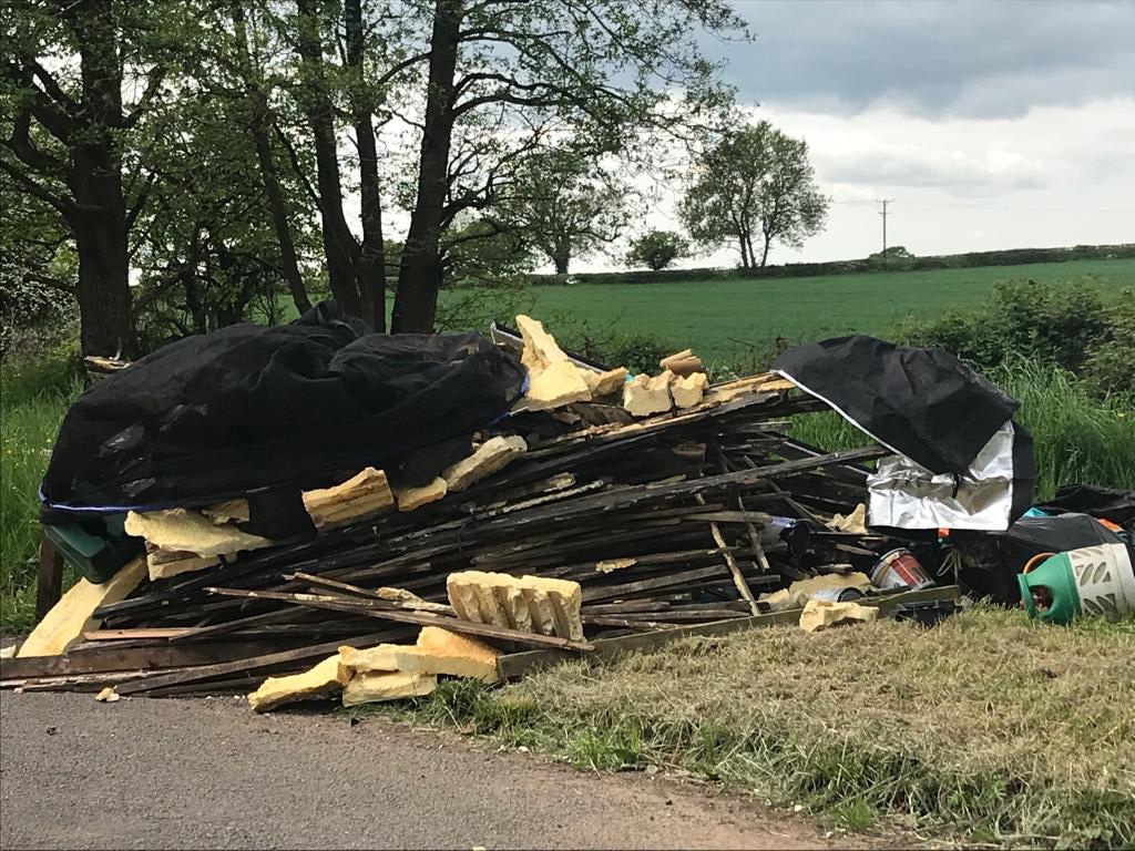 KeyAntony's tweet photo. @bitofstone does anyone recognise this load of rubbish dumped in the countryside near Stone , someone has probably paid someone good money for it to be disposed of legally. They are probably unaware of it being dumped on a roadside. https://t.co/RRyFIdtcG6
