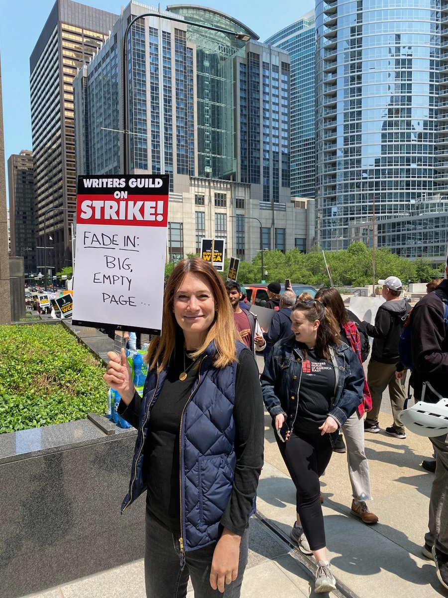 TheGillianFlynn's tweet photo. Striking with the WGA in Chicago to demand fair pay for the value we create for studios. #wgastrong https://t.co/nGobDBnNtG