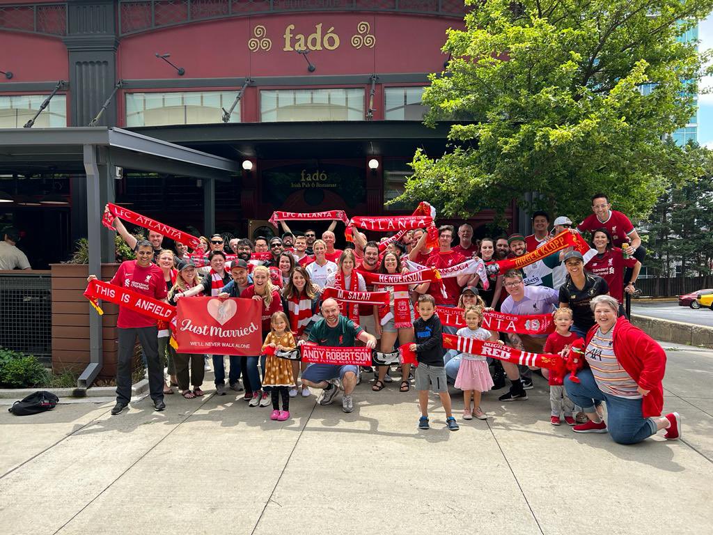 OLSCAtlanta's tweet photo. Two of our own Reds, @5SpotATL and Taylor, exchanging their vows at Anfield with the help of @LFCUSA’s #MyPLWish. They are pictured below in our May 6th #HTPhoto for #LIVBRE.
#YNWA you two! ❤️🔴❤️ https://t.co/SYlZRcfkeG