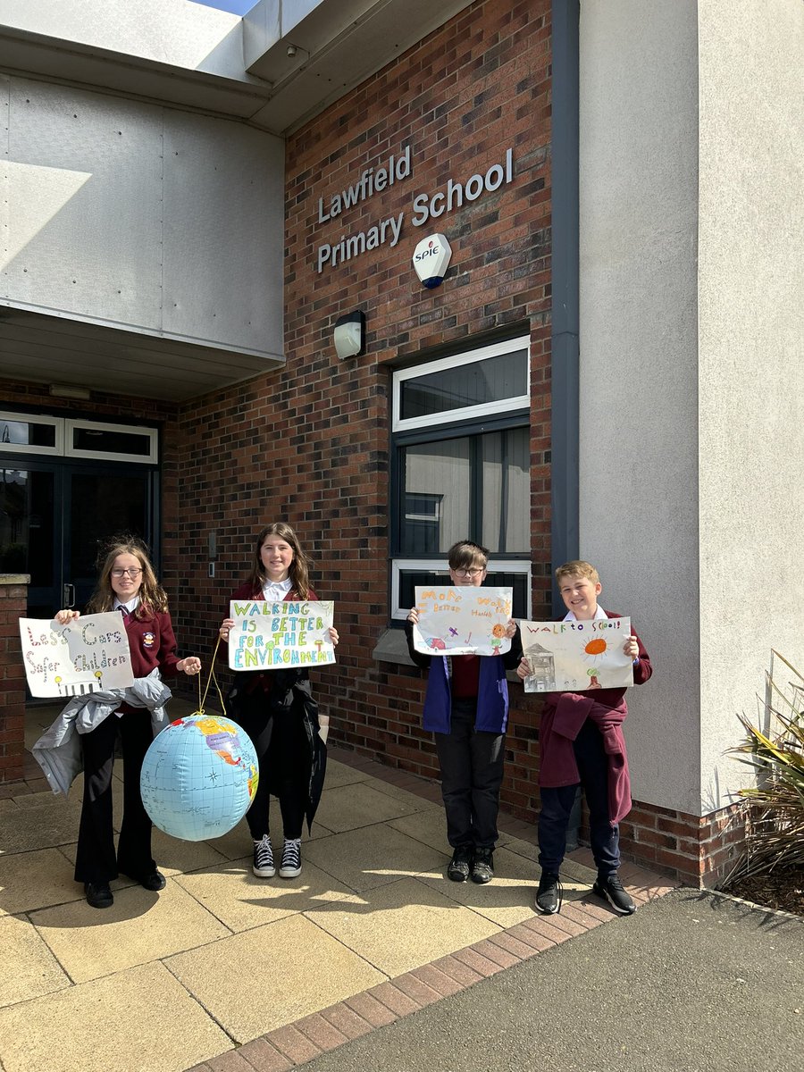 These P6 pupils walked from @stdavidsPS_ELC to @LawfieldPS this morning taking part in Walk to School Week. After receiving the baton from @woodburnps they embarked on a 2.5mile round trip and counted over 20 vehicle horn honks acknowledging their efforts! Well done everyone!!