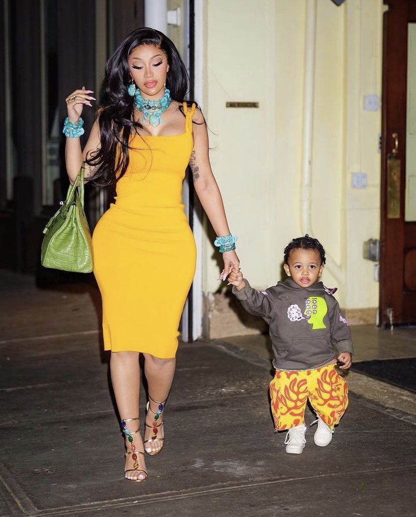 how chic is @iamcardib in our alina midi knit dress!!