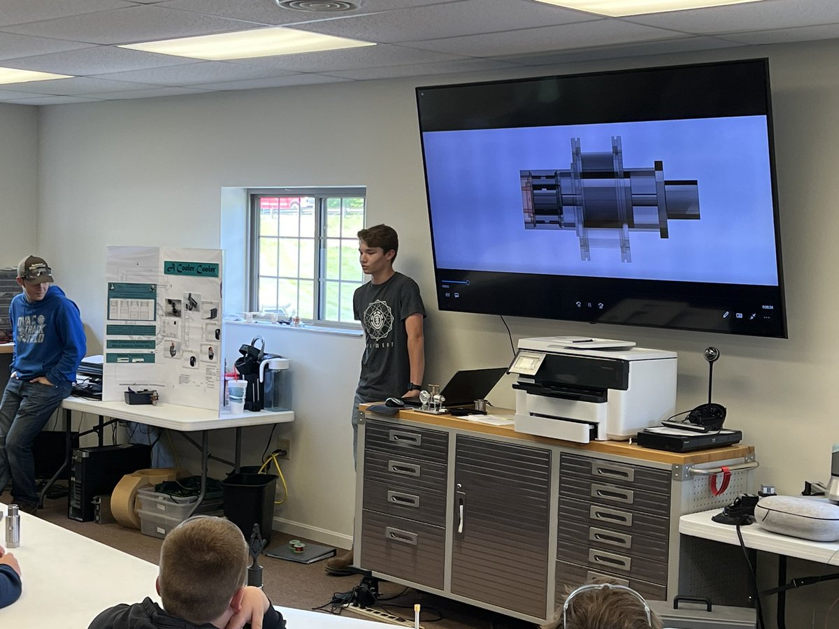 teachreit's tweet photo. It’s awesome to watch a former student teaching our current 8th graders. There will definitely be talk around the dinner table tonight. Thank you again Micro Machine Works and @LinnYost for hosting us for 2 days. #wmscte #creatingalegacy #creatinghope https://t.co/R2HQWV44LN