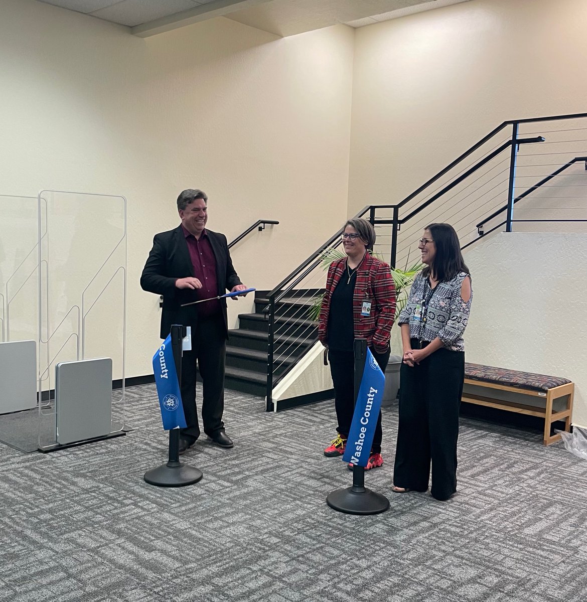 WashoeLibrary's tweet photo. Director @jdscott50 cut the ribbon today and announced that the the #SierraViewLibrary is officially open! We’re so excited to share this newly renovated community hub with our patrons. Stop by and enjoy all the new features added to this branch located in the #RenoTownMall. https://t.co/XZyHKmxmFM