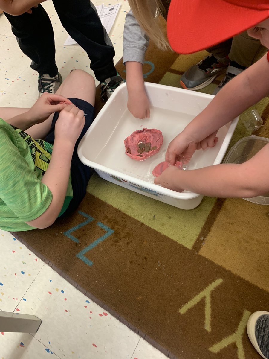 Grade1F's tweet image. Estimating, measuring, &amp;amp; recording the capacity of  various containers. How many small cups will fill each container? Extra water fun at the end to create something from clay that could hold at least 5 pennies &amp;amp; float. Way to go, P, for persisting &amp;amp; modifying to hold 15 pennies!