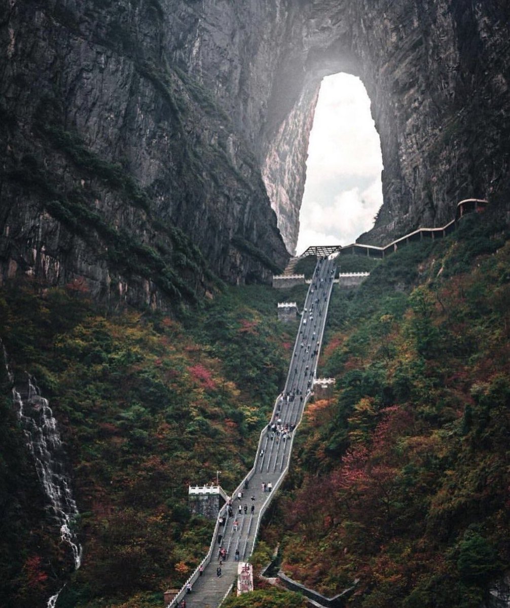 The celestial entrance known as 'Heaven's Gate' located within the breathtaking Tianmen Mountain in China.

Situated approximately 5,000 feet above sea level, Tianmen Cave in China stands as the world's highest naturally formed arch. 

Accessing this remarkable landmark involves