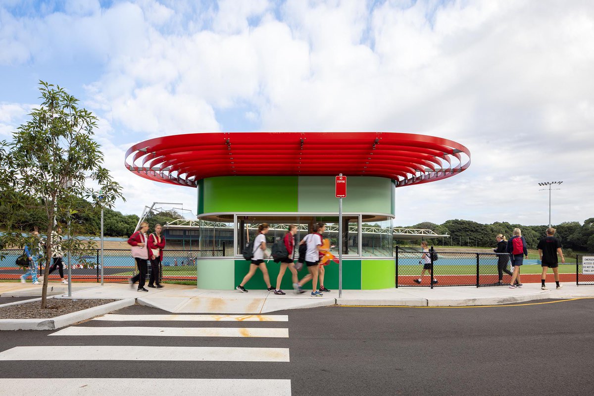 Our #esmarksathleticfield #ticketbooth here photographed by @saravita_photography Vulnerable to hot summer sun and dwarfed by its surrounds we sought shade and scale with amplification and personification of the lovely red track geometry #publicsydney #publicfun