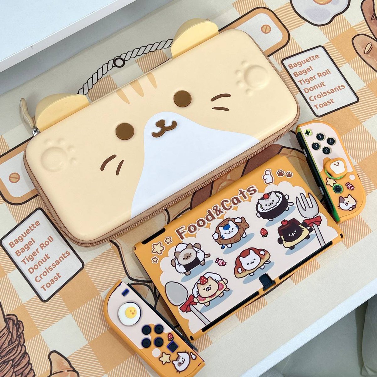 New additions to the Cat Restaurant!🍞🍳🥖#comingsoon2023

These two items are available now
>Cat Ears Carrying Case
bit.ly/3odaAZG
>Bakery Cat Mouse Pad
bit.ly/433XWuM

#Nintendo #NintendoSwitch #switchaccessories #nintendoswitchgames #catlover #tloz