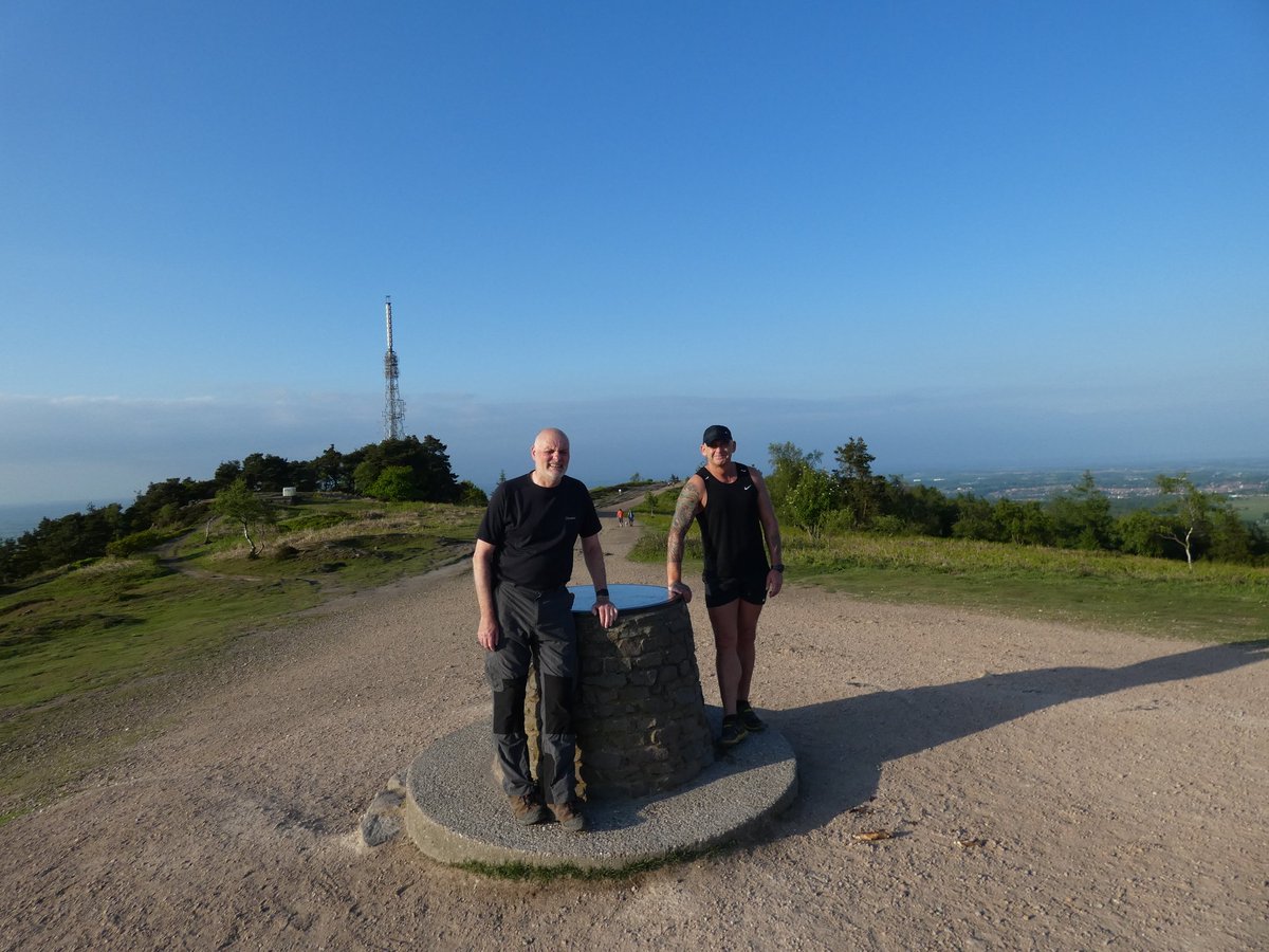 Still hot walking up the wrekin tonight . Cracking night for it .