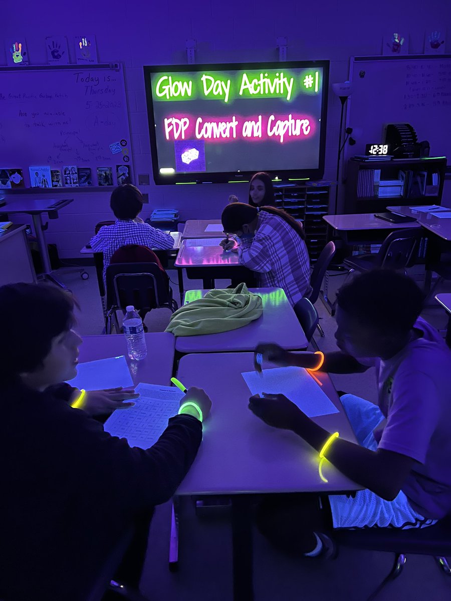 MrsDiamondLCPS's tweet photo. Glow Day stations to practice fraction, decimal, and percentage conversions @JML_MS_Official #glowday https://t.co/YHHa6BmNkM