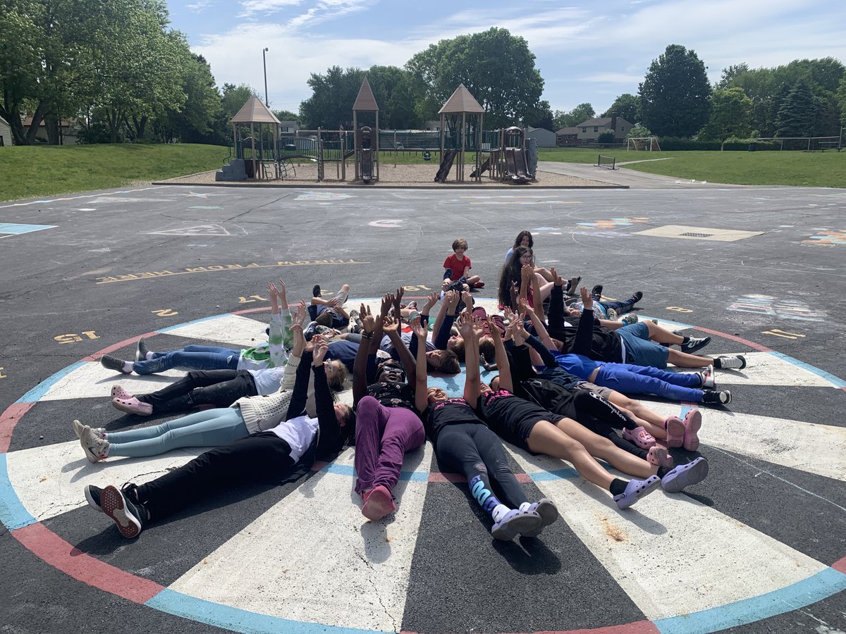 Miss Vettrus's 5th grade class sharing a moment in the sunshine to celebrate their last days as elementary students.🌞♥️ #BetterTogetherDCS