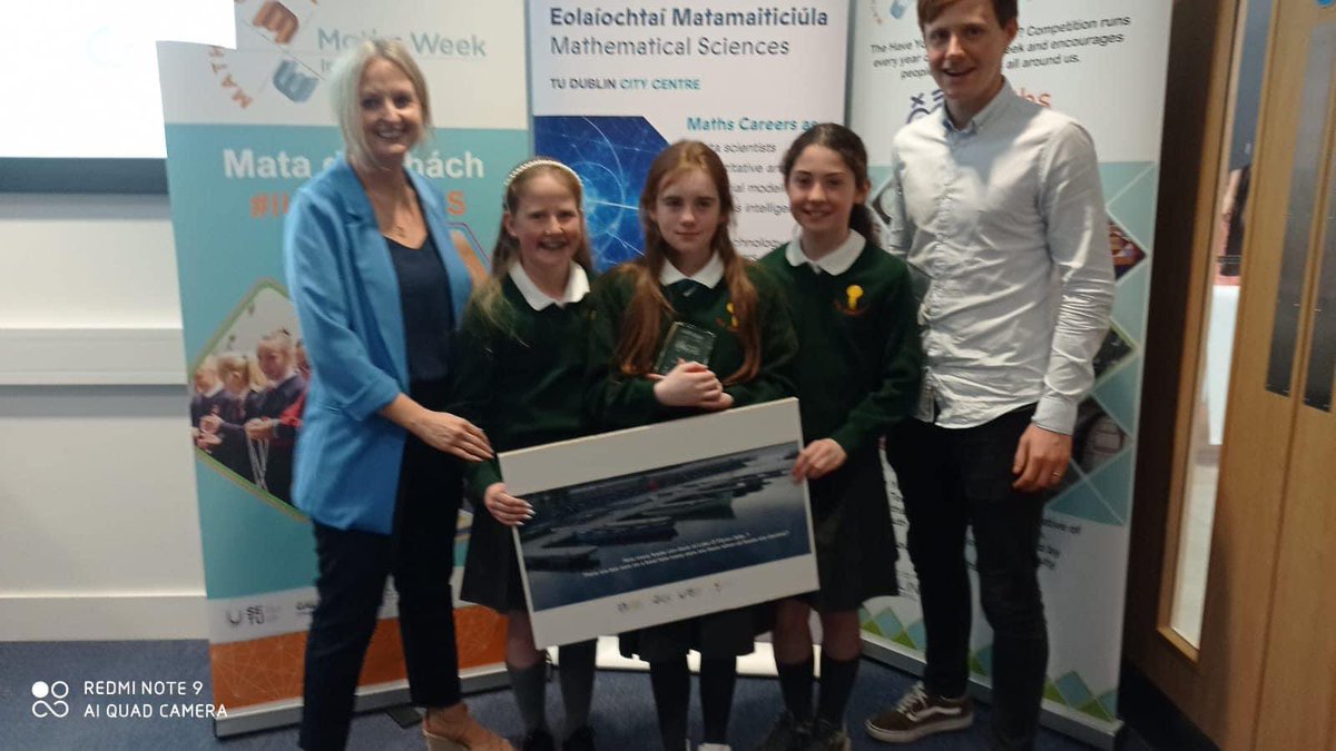 TarmonNS's tweet photo. Congratulations to Katie who won the “Have You Got Maths Eyes?” Competition as part of Maths Week. Katie captured a photograph of Lake O’Flynn and posed mathematical questions about the picture. Today Katie accepted her award from Norma Foley. @mathsweek @DCUCMS @ppdcuioe https://t.co/fdTQcA9aeQ