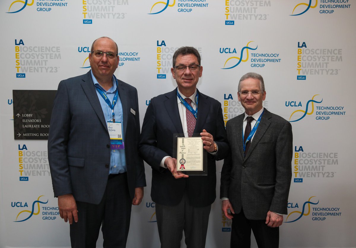 UCLATDG's tweet photo. Very happy to present a patent that was created at @UCLA to Dr. Albert Bourla, Chairman & CEO, @pfizer. #LABEST2023 https://t.co/EWlDGV9ztW