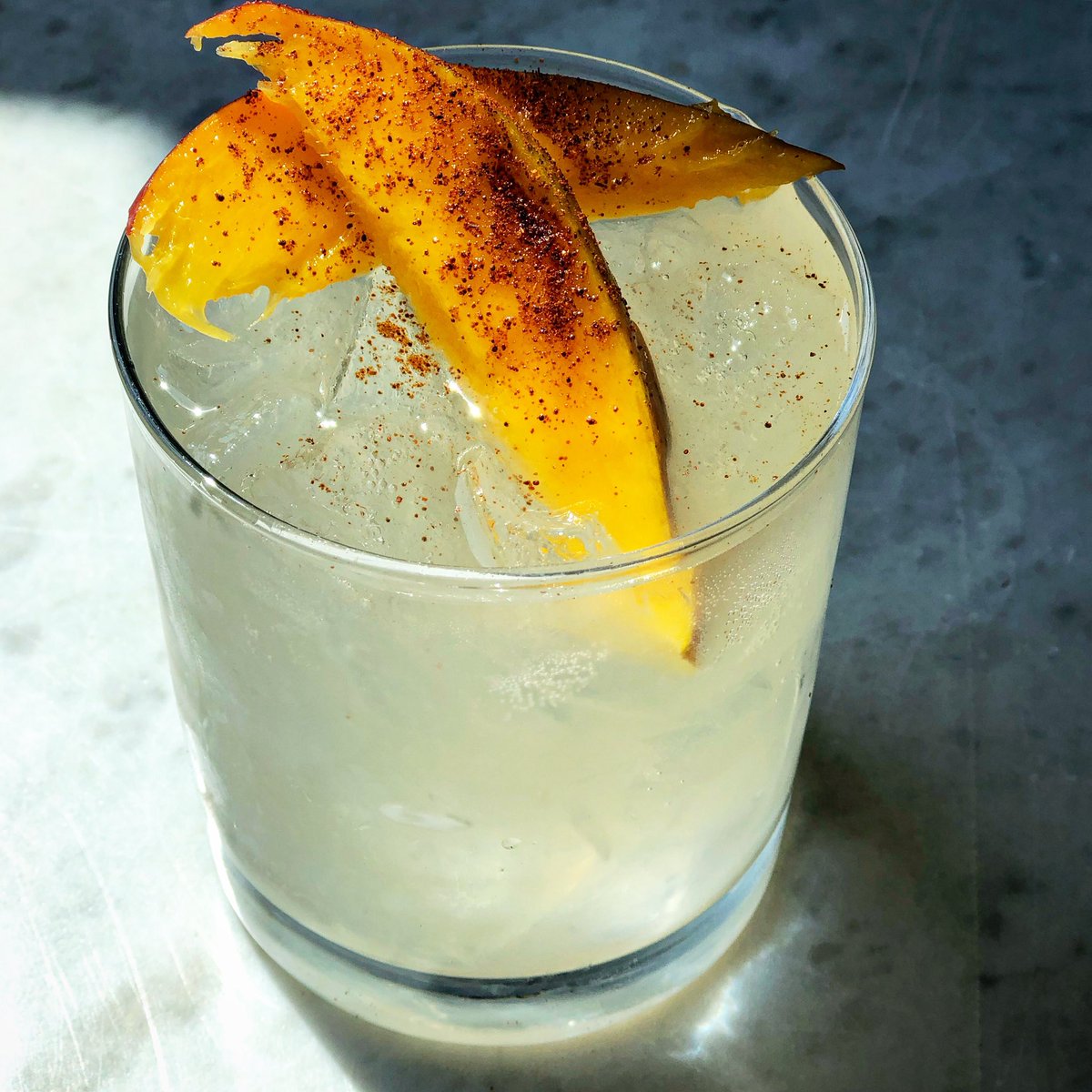 // We are leaning into this season’s flavors for the holiday weekend at SR! Featuring ⚡️The Electric Feel⚡️a rum based cocktail with mango, chile, ginger, and a kiss of fresh lemon juice // #spiritroomwi 
•
•
OPEN | THURSDAY | MAY 25 | 4-1OP