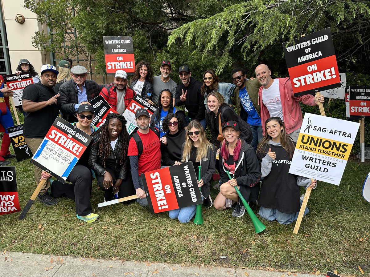 Ildymojo's tweet photo. Lucifer Day on the strike lines!😈❤️ So happy to see these beautiful faces in one place again. Sad it has to be under these circumstances. C’mon AMPTP, we just want to be respected, appreciated and fairly compensated for what we ALL bring to the table. #wgaunionstrong💪 #lucifer https://t.co/J71i9U4RHQ