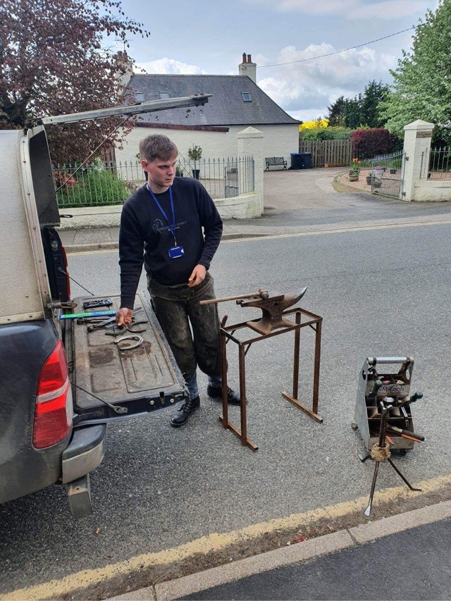 Coops8151317's tweet photo. Yesterday, 17th May, we were lucky enough to have a visit from a local farrier, Dylan Kirk. Dylan came in to School to demonstrate his skills and to talk to some of the children and staff - Dylan also talked about the Coronation arch he made from old shoes. https://t.co/ACy10m37mW