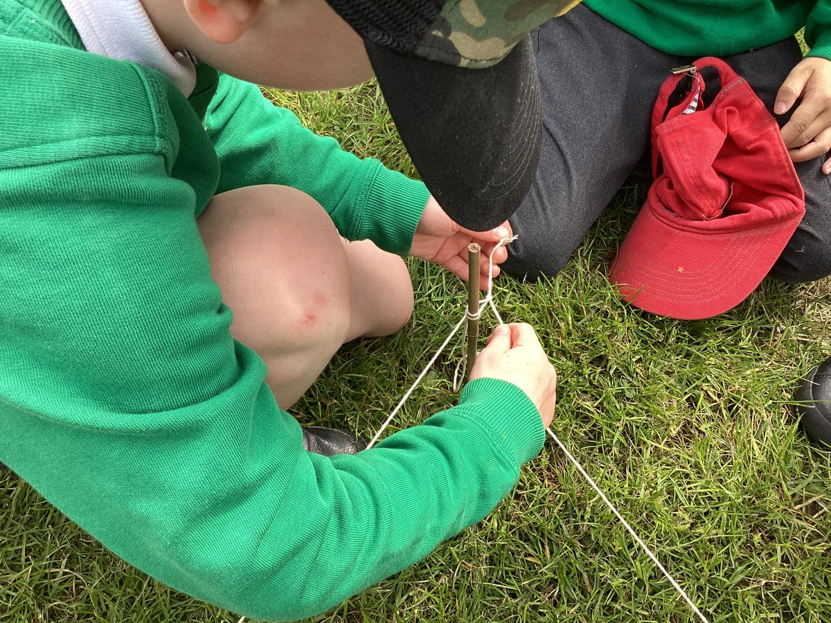 whcps's tweet photo. Reception have had a fun morning outdoors as part of #OutdoorClassroomDay. Some of the children practised their fine motor skills, using string, sticks and flowers combined with a splash of creativity to make wands, birds, planes and dragons. #whcoutdoorlearning #whceyfs https://t.co/HSJtaNRYAG
