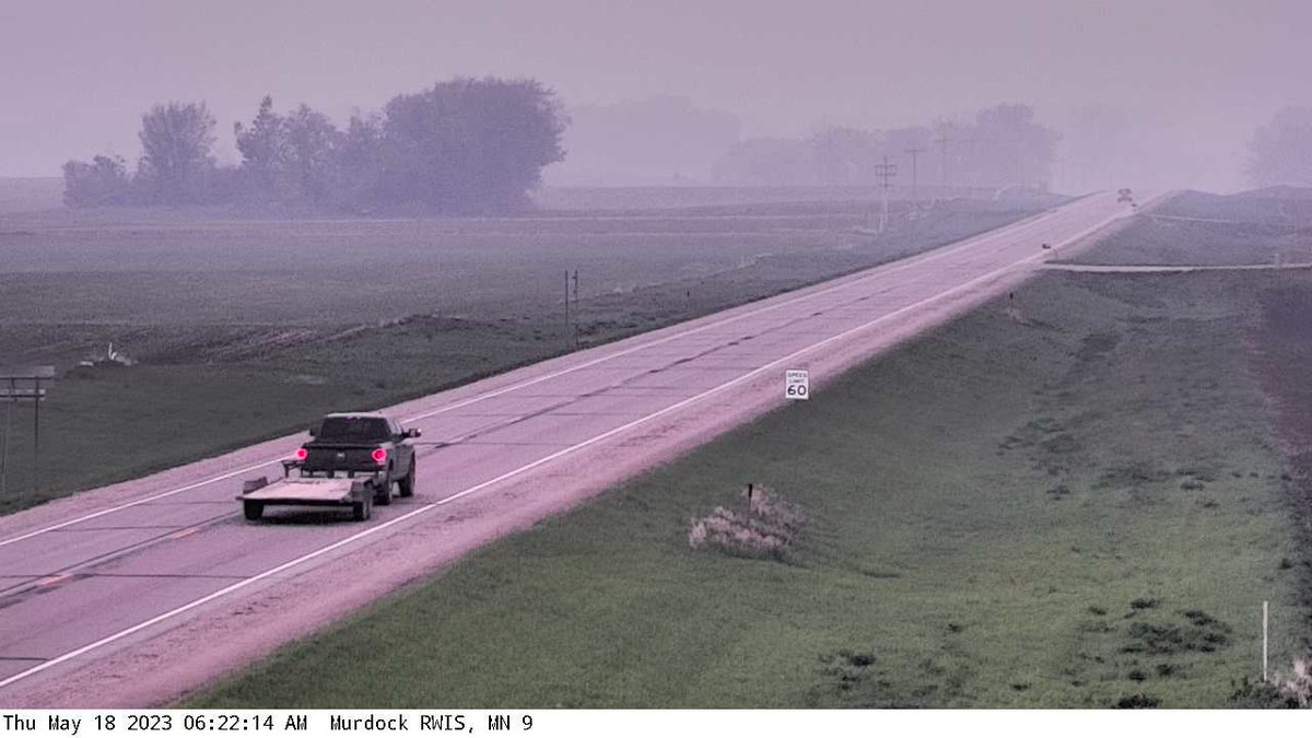 NWSTwinCities's tweet photo. Today's the day that all that smoke comes down to the surface. Check out this smokey @mndotwcentral webcam in Murdock, MN this morning #mnwx https://t.co/kRWfCSJMK1