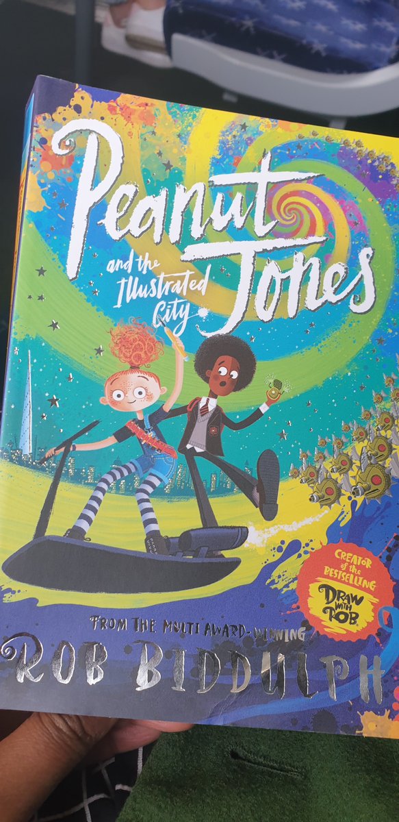 Edinburgh-bound to speak about children's publishing at the @PublishScotland 
@BAbooksellers
 #ScotBookConf with this lovely book (by @RobBiddulph) as company on the train 🌈