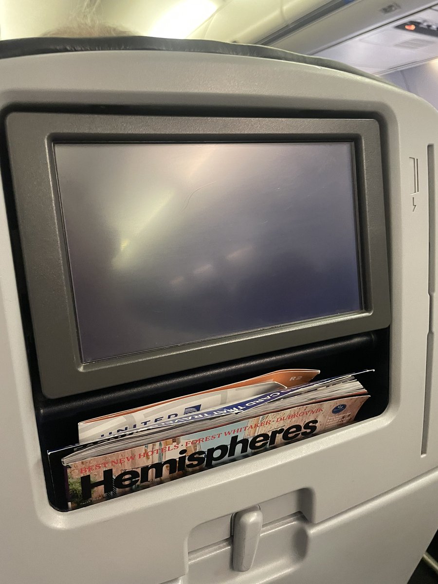 Tim___C_'s tweet photo. @united  I pay great money for a flight and the entertainment doesn’t work. What gives ? https://t.co/v3vJFKO0rx