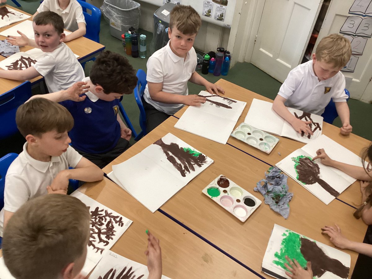 Last week in Art, we sketched one of the trees on the playground. This week we used different techniques to paint our trees using our fingers as brushes.