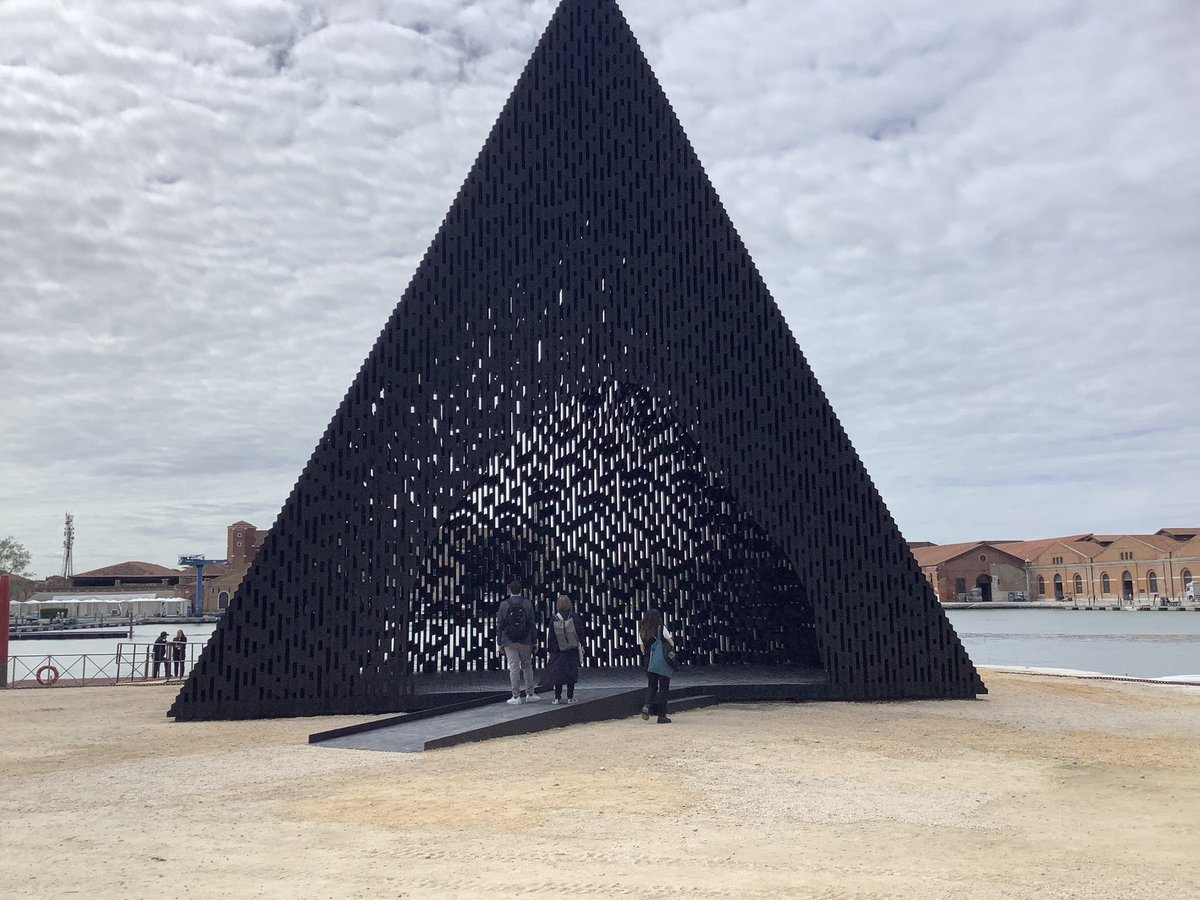 WACommunity's tweet image. David Adjaye (@dadjaye) installs a huge black wooden triangular prism, envisioned as a space for both reflection and active programming.

More info about the project will be online on @wacommunity soon!

#venicearchitecturebiennale2023 #davidadjaye #installation #wood