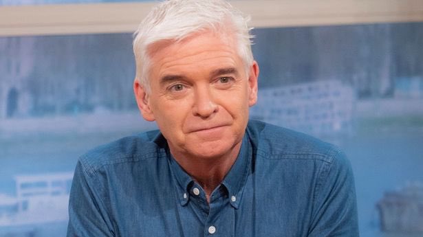 FakeShowbizNews's tweet photo. Phillip Schofield makes things even worse with his ITV colleagues by heating up fish in the work microwave https://t.co/MM4IfH37zz