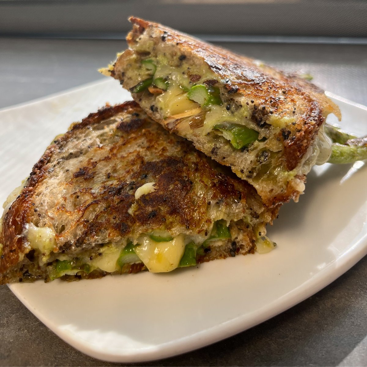 Spring in Michigan has brought us a bounty of amazing new produce to work with. New menu items include this super savory, little beauty... a ramp and asparagus grilled cheese on righteous seed.

We also have miso soup with seasonal veg, and our fish sando is back on the menu.