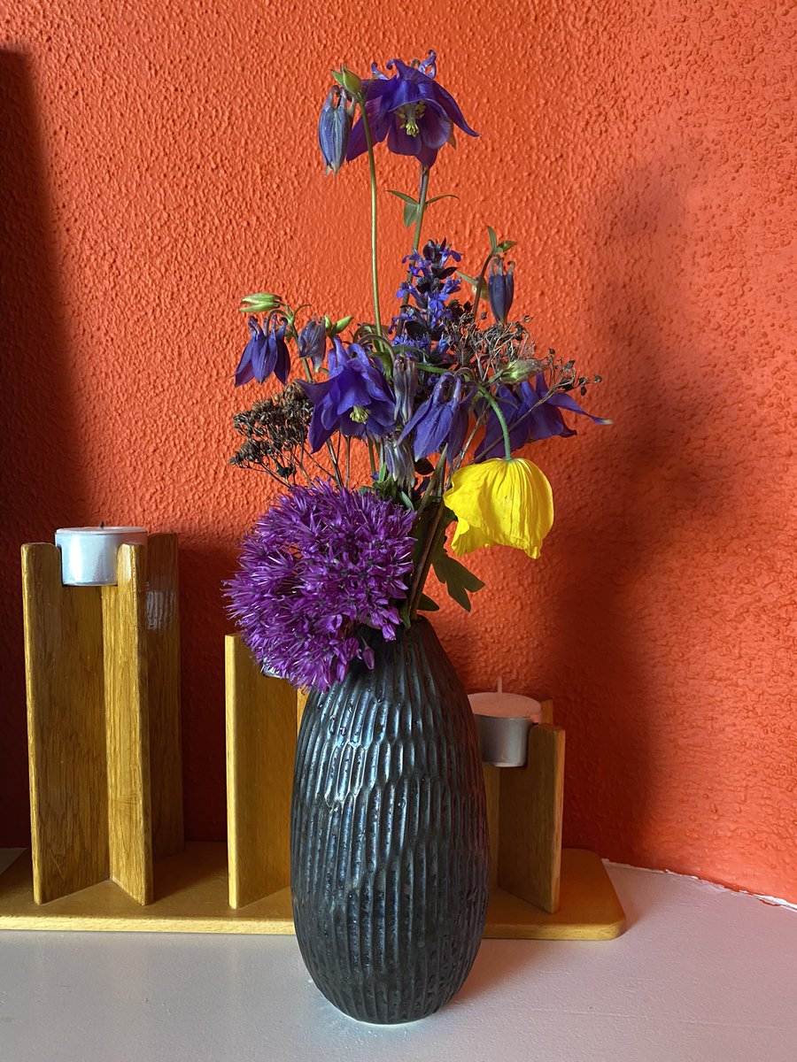 My son’s garden bouquet du jour. He has an eye for color, I think.