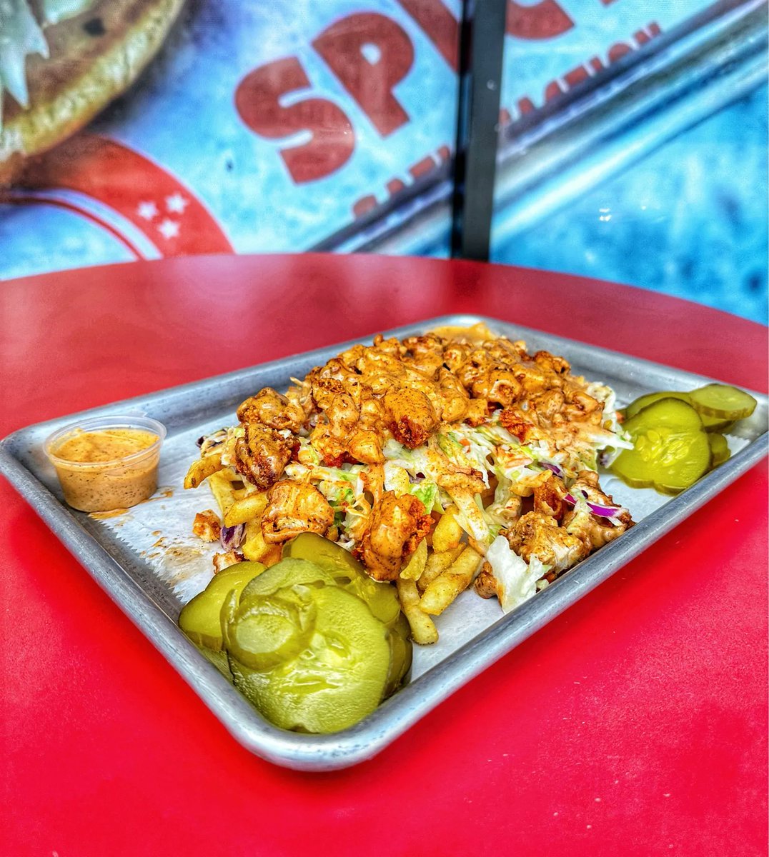 We’ll be DROOLING over these Nashville Hot Fries 🍟 until further notice 🤤🔥 2pc Tenders chopped, Seasoned Fries, Coleslaw, Pickles, Drizzled with Pink Sauce 🙌