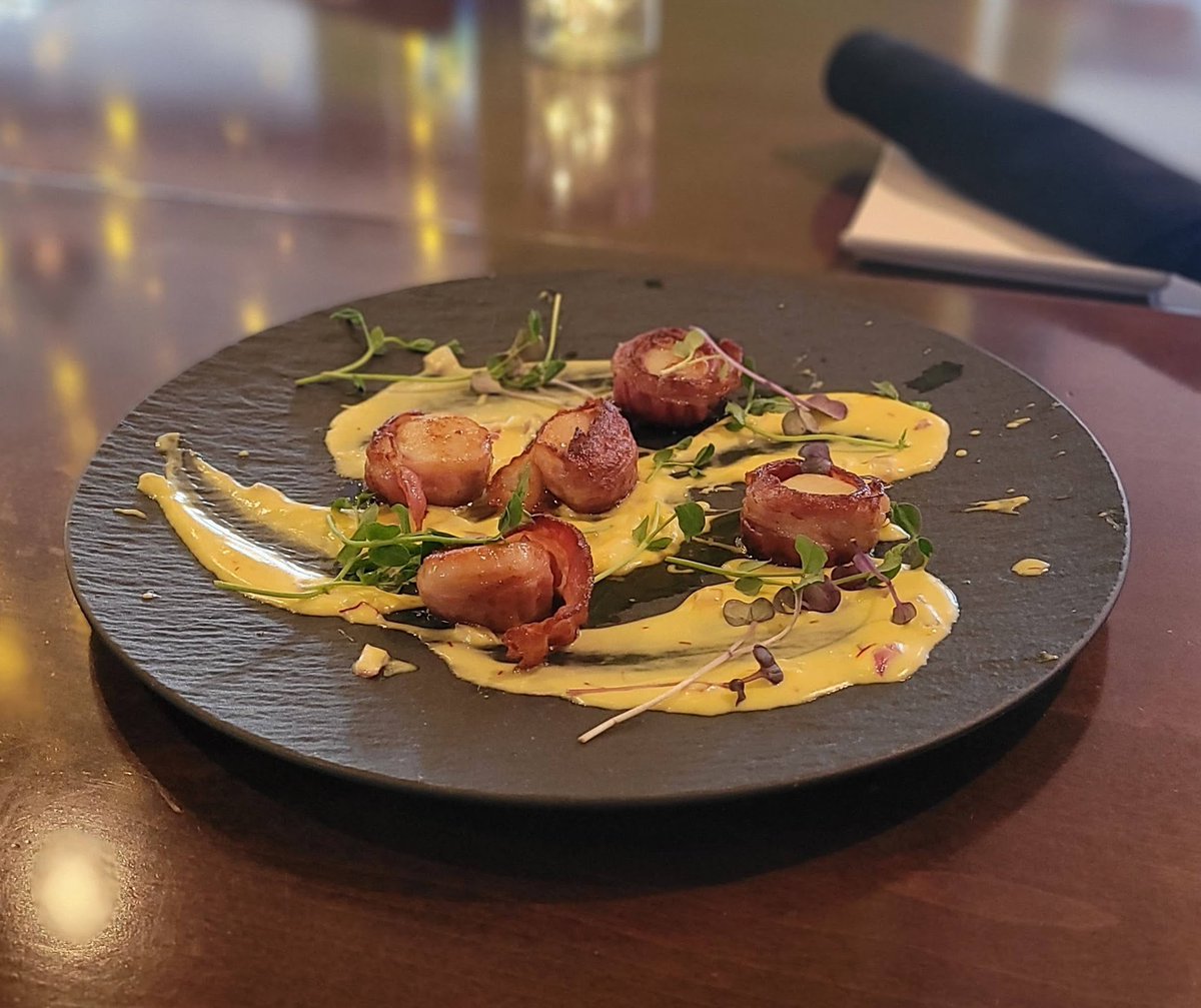 TRTrattoria's tweet photo. Dive into a sea of flavor with our Bacon Wrapped Digby Scallops! Known for their succulent sweetness and tender texture, these scallops are a treasure from the ocean. Served seared to perfection.
#digbyscallops #oceanicepicure #baconwrappedscallops #terrarossa #wolfville https://t.co/CFptS1rrQ1