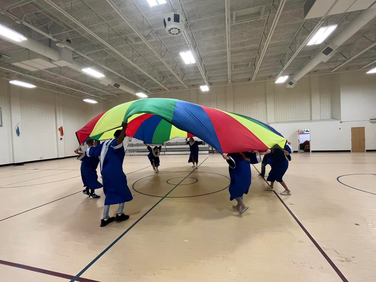 Today we celebrated with <a href="/LGHS_HCS/">LGHS</a> Seniors who were once LGE Wildcats!  One last walk through our halls before they graduate!  And one last parachute game!  Congratulations and best wishes!