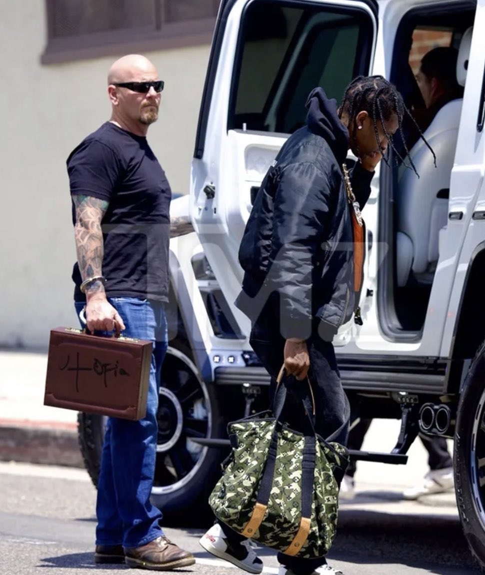 Rap301 on X: Travis Scott Arriving At The Louis Vuitton HQ In Paris With  The Utopia Briefcase 💼  / X