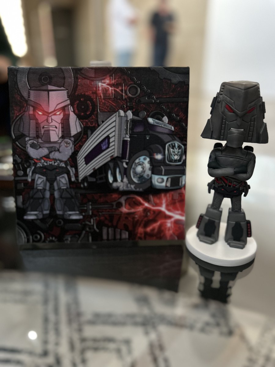 MEGATRON APPROVES. 

Jk jk, but in all seriousness this little surprise bobble head and wall canvas from <a href="/MetaMotorsArt/">MetaMotors.Eth</a> is sick! 

Shout out <a href="/VFriendsEth/">Cohen🍷💎 - VFriends.Eth</a> and <a href="/road2veecon/">road2veecon.eth | MetaMotors | VeeDAO</a> for the epic gifts! 🙏