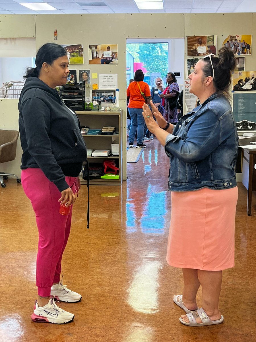 How do we build power? It starts by talking with each other and finding a common goal. Here, Nyasha and Theresa are talking about how our kids need functioning schools. Too many are falling apart! That's why their Alamance Chapter is fighting their county commission.