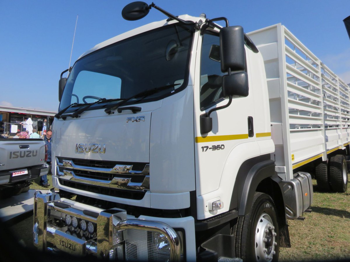 FOCUSmagSA's tweet image. ISUZU Motors South Africa, which notched up its 10th consecutive year as the truck market leader in 2022, has a particularly interesting stand at Nampo 2023 Harvest Day. One of the stars of the stand is this 2023 Isuzu FX-Series FXR 17-360 Cattle Carrier, which is #ReadyForWork.