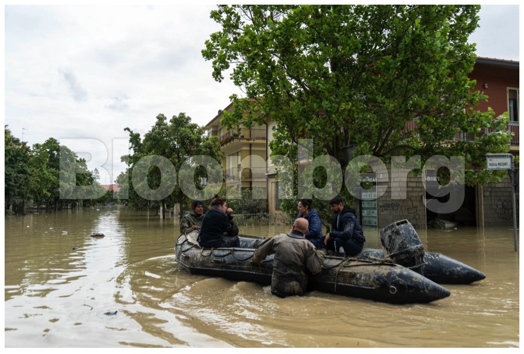 Rescue workers on an inflatable boat help residents move through flood water following heavy rains in Faenza, in the Emilia-Romagna region of northern Italy, on Thursday, May 18, 2023. Francesca Volpi/Bloomberg @bloombergimages #italyfloods