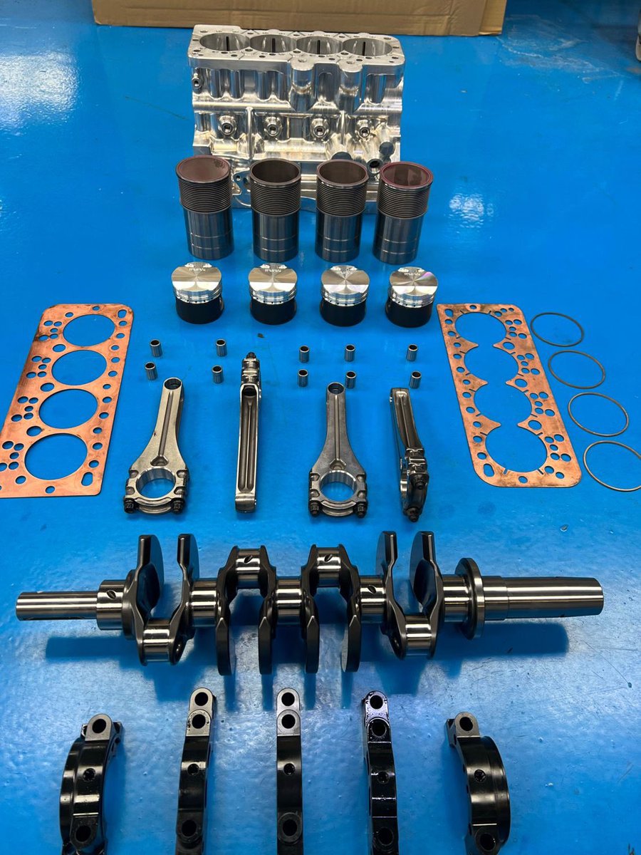 AandMEDM's tweet photo. A+5 engine - main parts laid out ready for assembly of 1071cc #Turbo engine.
#Aseries #Mini16v #MiniRacers #CNCmachining #precisionengineering #gbmfg #UKmfg #GBmfg https://t.co/0aGt4jY8uA