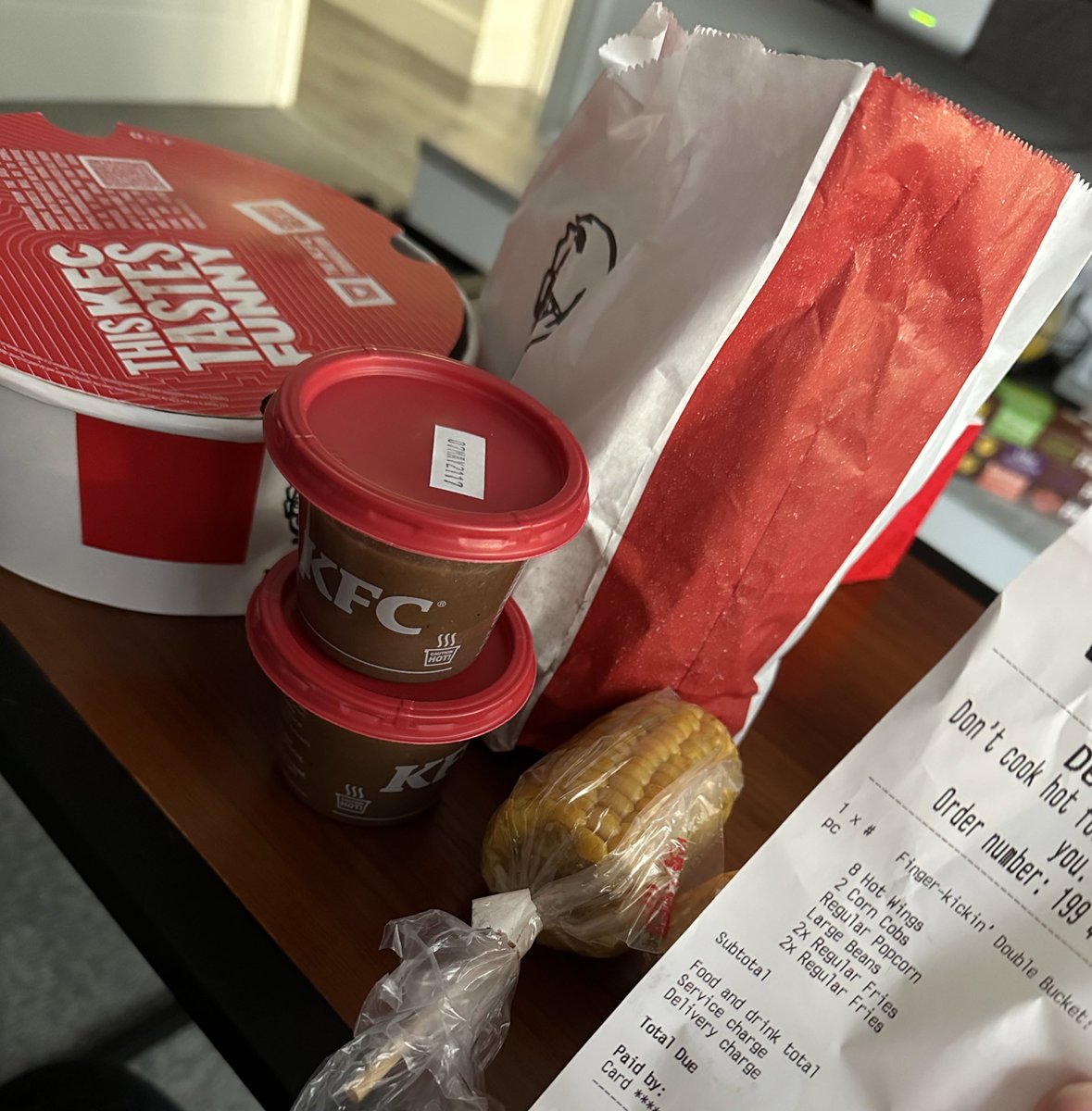 Insert_c0in's tweet photo. @KFC_UKI_Help I ordered a finger kickin double bucket expecting to get what I selected - popcorn chicken and large beans.. yet I got gravy and strips?! This is the second time KFC has got orders wrong. https://t.co/iRt5SviXhc