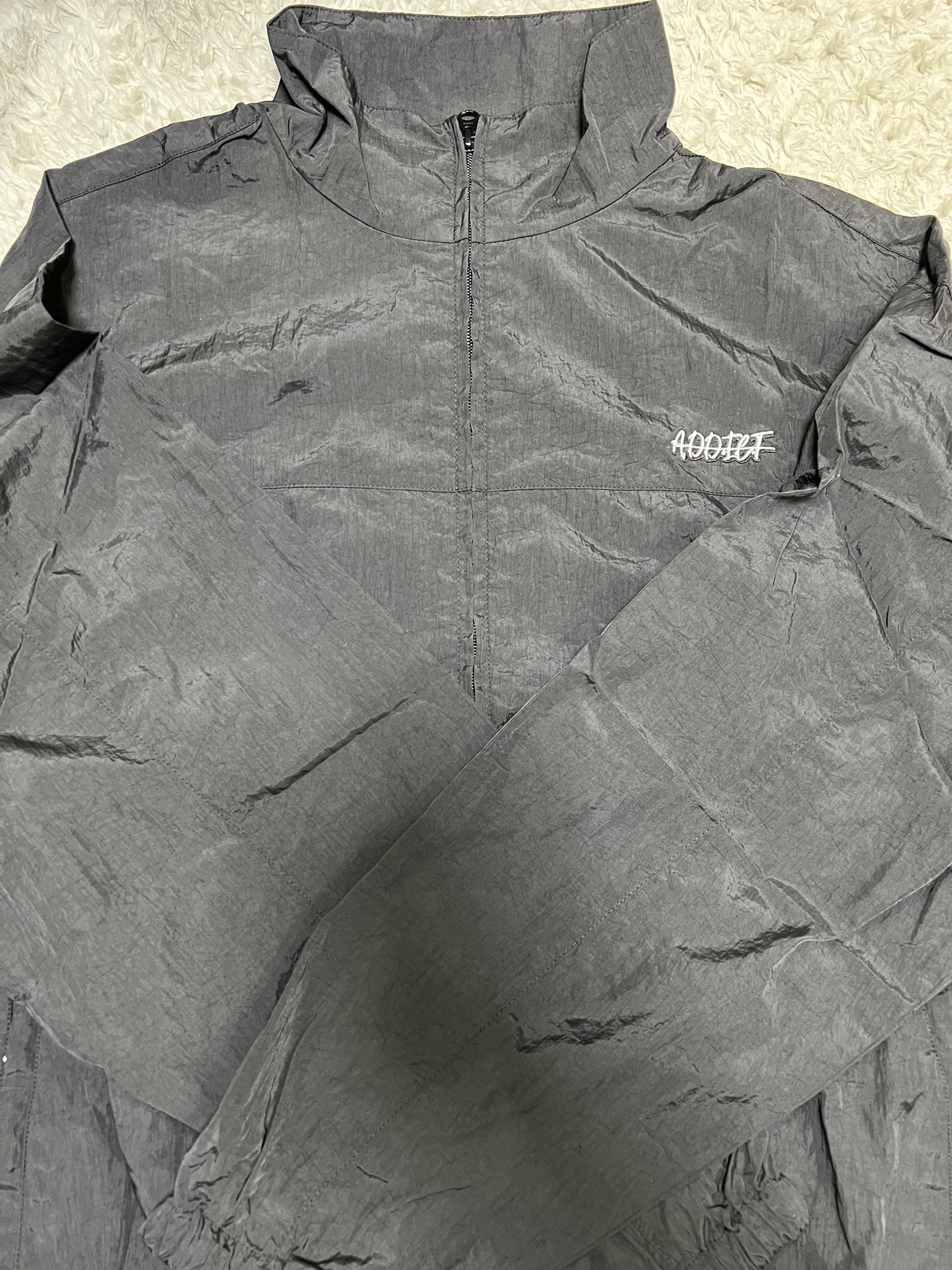 WEB限定デザイン バルーントラックジャケット a.d.d.i.c.t