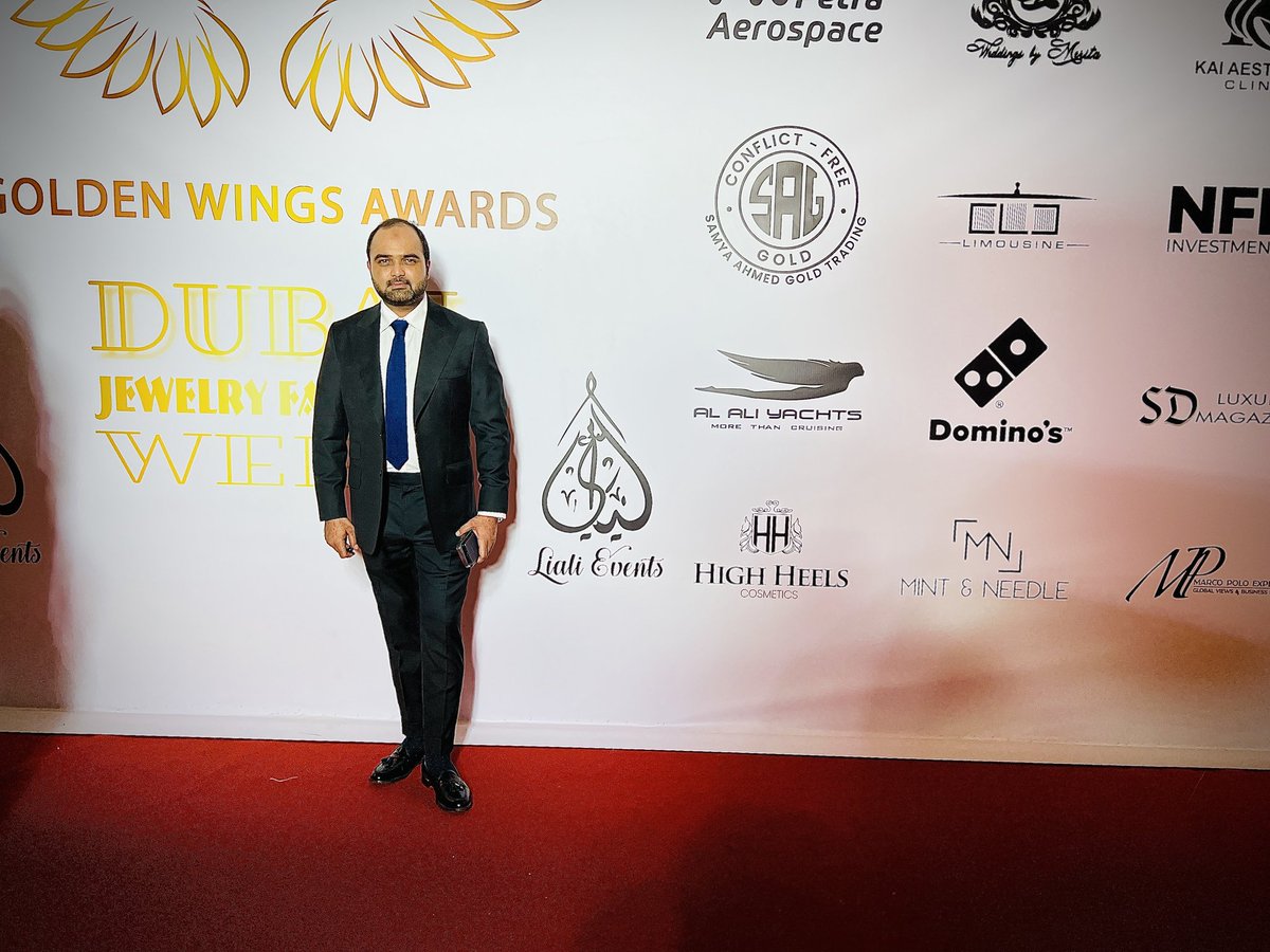 At the Golden Wings Award red carpet with @drjunaidalishah. It’s truly inspiring to be here among such incredibly talented individuals and represent Pakistan as Ferhat Polat’s designer! @goldenwingsmagazine #SarfrazAkbar #goldenwingsmagazine #drjunaidalishah #dubai #burjkhalifa