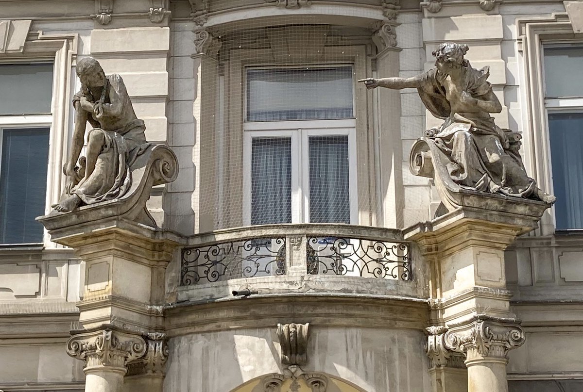 Statues of Prague. A city stuffed full of statues, some more remarkable than others. This disputation is in the Old Town Square. Her on the right has clearly taken exception to some indiscretion by him on the left.