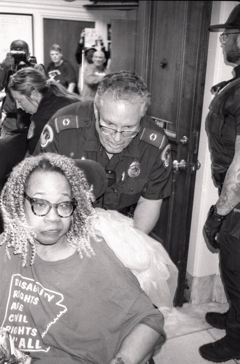 NolanRyanTrowe's tweet photo. new photos and story up in @NewYorker about the #disabilityrights group #ADAPT and how they protested and sat in #KevinMcCarthy's office, to be dragged out by the Captiol Police in their wheelchairs. https://t.co/9mJkqVnlak