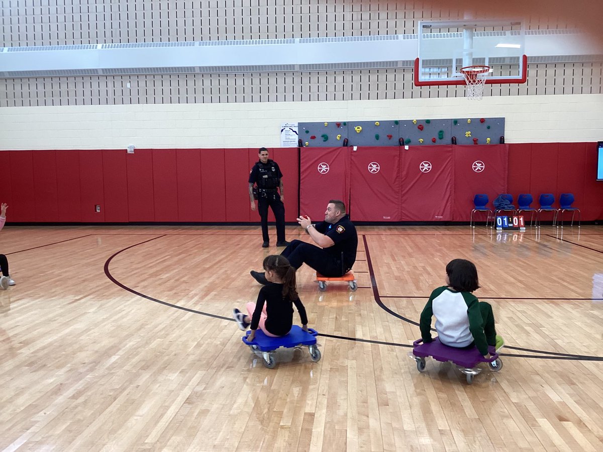 Scooter basketball fun with officers Cristian, Mike, Randal and Kevin from Woodbridge Police. #RSS11@rotellawarren #nationalpoliceweek