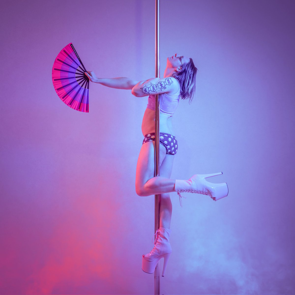 With a big pole ;) 🩷💜💙