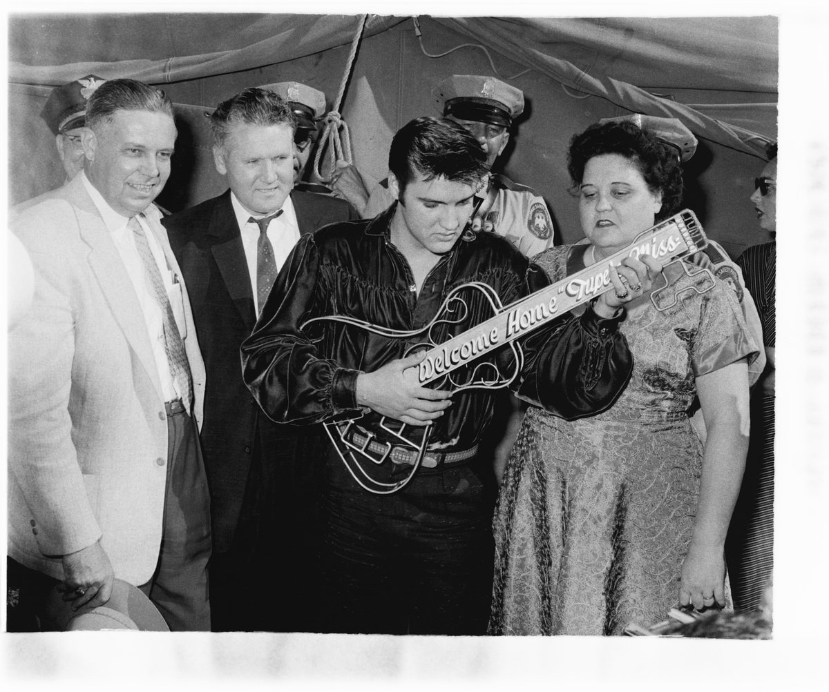 Elvis receiving the key to the city before his 1956 Homecoming concert in Tupelo.