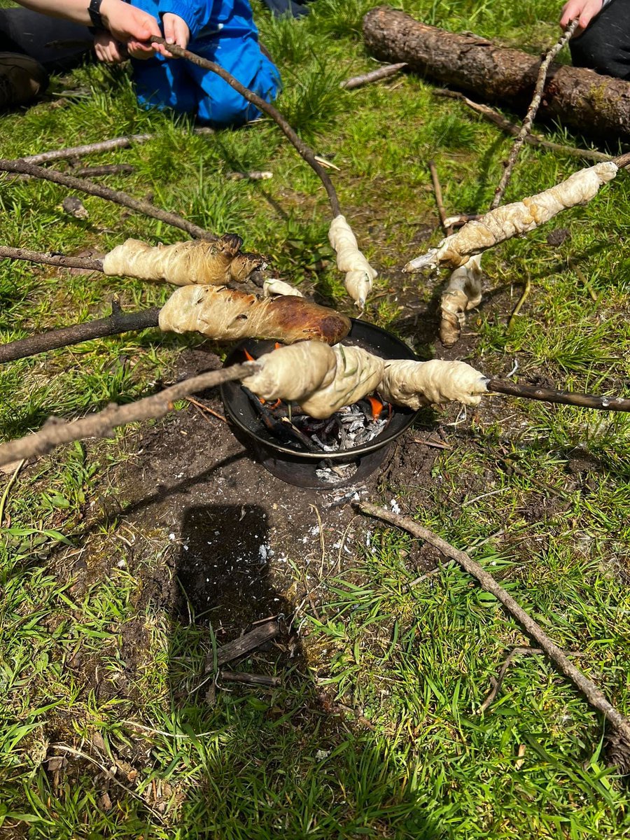 This morning, we cooked damper bread on sticks over a fire in the woods, to go with our soup for lunch. The bread had fresh rosemary picked from our nursery garden. The children said it tasted “nummy” and “delicious”. 🥰 #campfirecooking #homegrown
