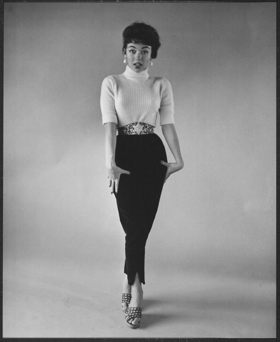 #RitaMoreno wears a turtleneck sweater and slacks.
#FashionFriday